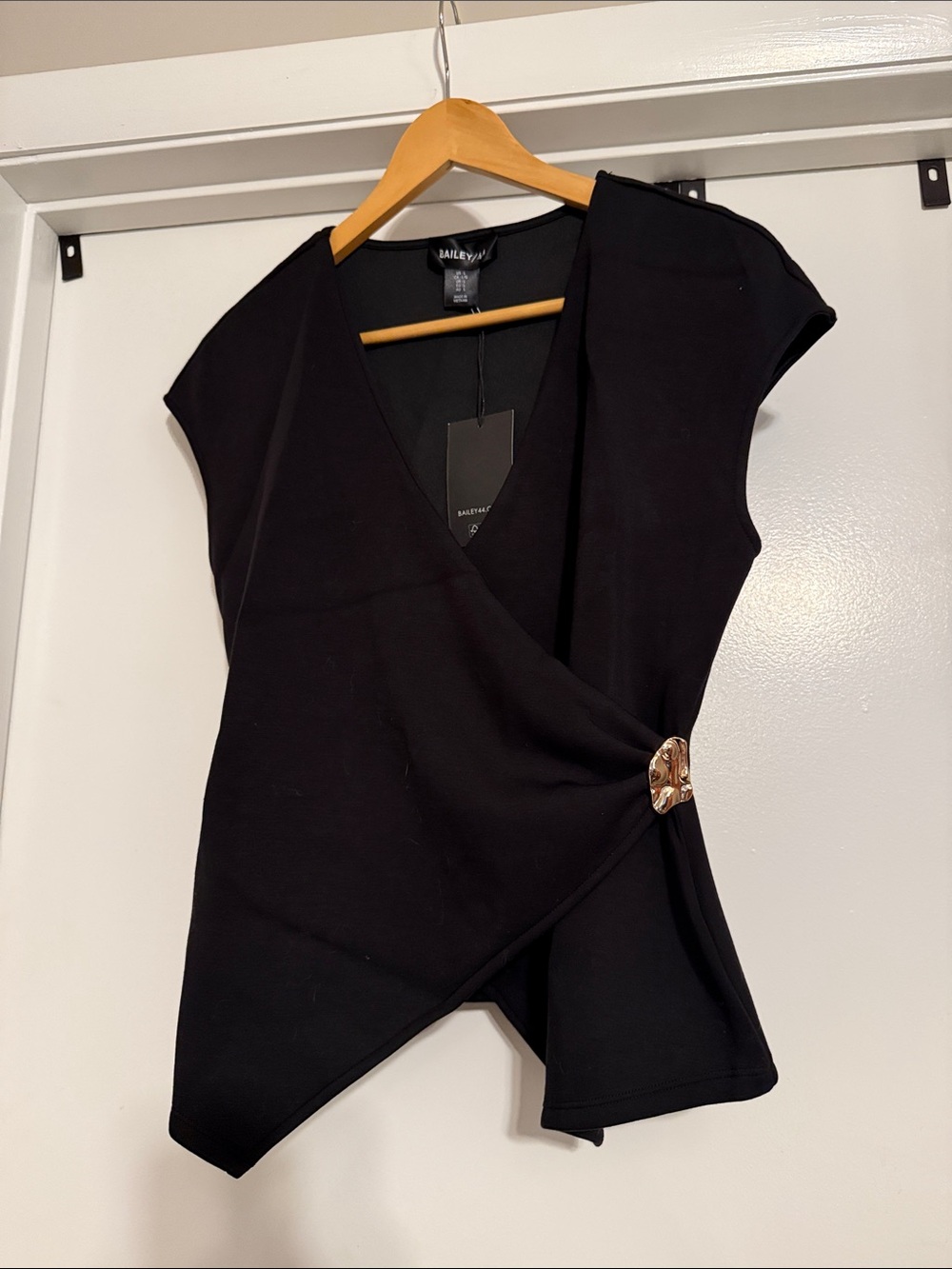 Bailey 44 Black Wrap Top with Gold-Tone Side Accent